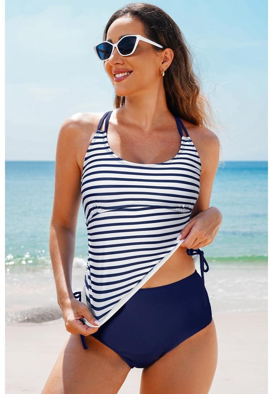 Our styles are designed with a trendy fitted look in mind following an international size standard. For the best fit we suggest choosing one size up from your usual. Be sure to check our sizing chart to find your perfect match!
  Color block design for the tankini top
  Strappy back
  Drawstring sides
  Includes floral print swim shorts
  Multiple color and size options available
Material: 82% Polyamide 18% Elastane