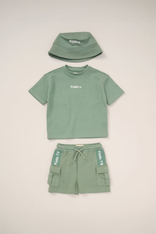 This stylish 3-Piece outfit set from Fudo includes a short-sleeve t-shirt, shorts, and a matching bucket hat. The t-shirt and hat feature a bold Fudo logo on the front, while the back of the tee showcases a large graphic palm tree print for a statement look. The shorts are designed with mesh panel details and two side pockets, perfect for laid-back, everyday style.
