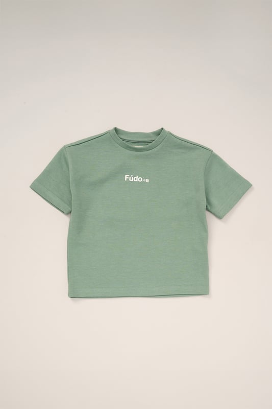 This stylish 3-Piece outfit set from Fudo includes a short-sleeve t-shirt, shorts, and a matching bucket hat. The t-shirt and hat feature a bold Fudo logo on the front, while the back of the tee showcases a large graphic palm tree print for a statement look. The shorts are designed with mesh panel details and two side pockets, perfect for laid-back, everyday style.