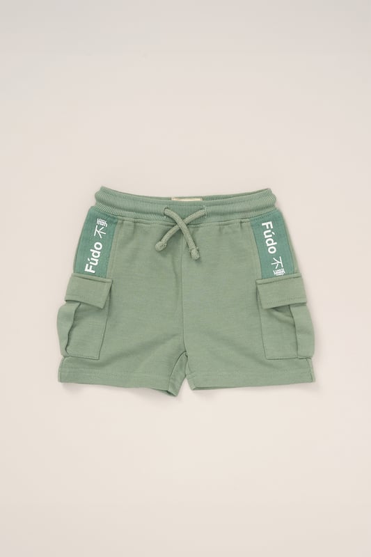 This stylish 3-Piece outfit set from Fudo includes a short-sleeve t-shirt, shorts, and a matching bucket hat. The t-shirt and hat feature a bold Fudo logo on the front, while the back of the tee showcases a large graphic palm tree print for a statement look. The shorts are designed with mesh panel details and two side pockets, perfect for laid-back, everyday style.