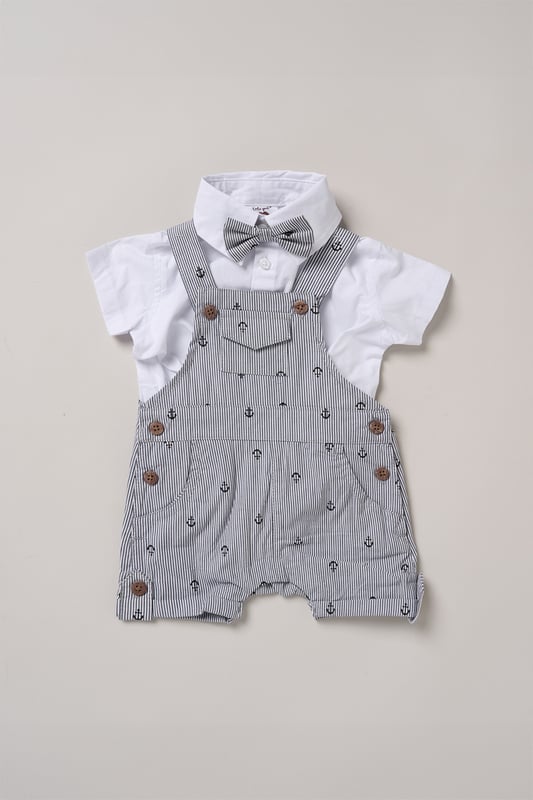 Dress your little one in style with this adorable bodysuit shirt and dungarees set by Little Gent. Complete with a charming bowtie, this outfit is perfect for any occasion. Designed with playful charm and practicality in mind, it’s an ideal choice to keep your little one looking dapper all day long.