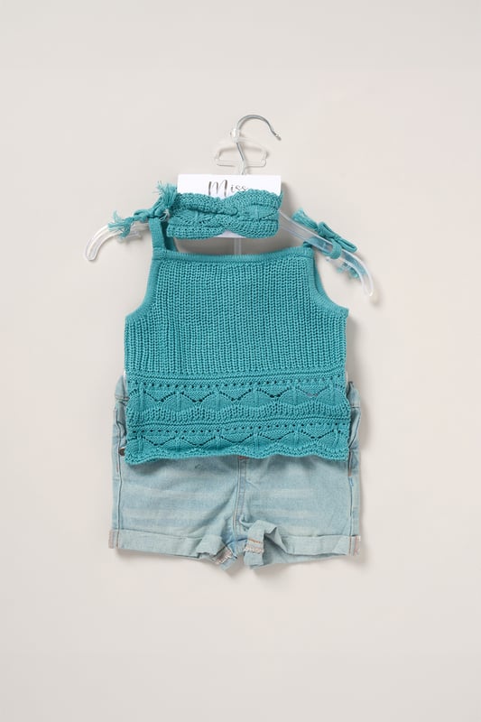 This adorable set by Miss includes a true knit top, denim shorts, and a matching headband. Perfect for warm days, it combines style and practicality, making it an ideal choice for playdates, outings, or casual summer looks.