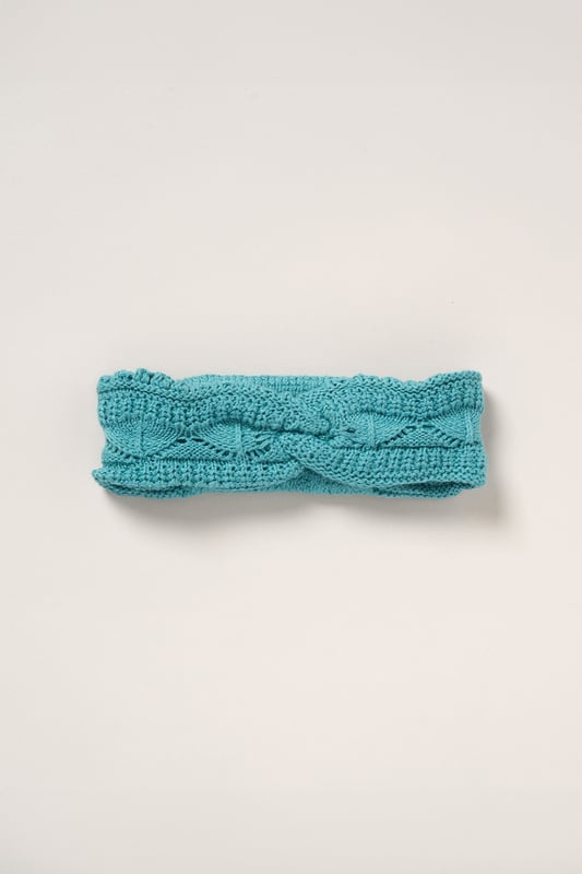This adorable set by Miss includes a true knit top, denim shorts, and a matching headband. Perfect for warm days, it combines style and practicality, making it an ideal choice for playdates, outings, or casual summer looks.