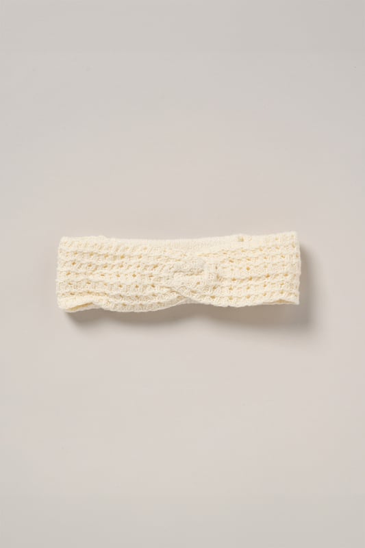 This adorable set by Miss includes a true knit top, denim shorts, and a matching headband. Perfect for warm days, it combines style and practicality, making it an ideal choice for playdates, outings, or casual summer looks.