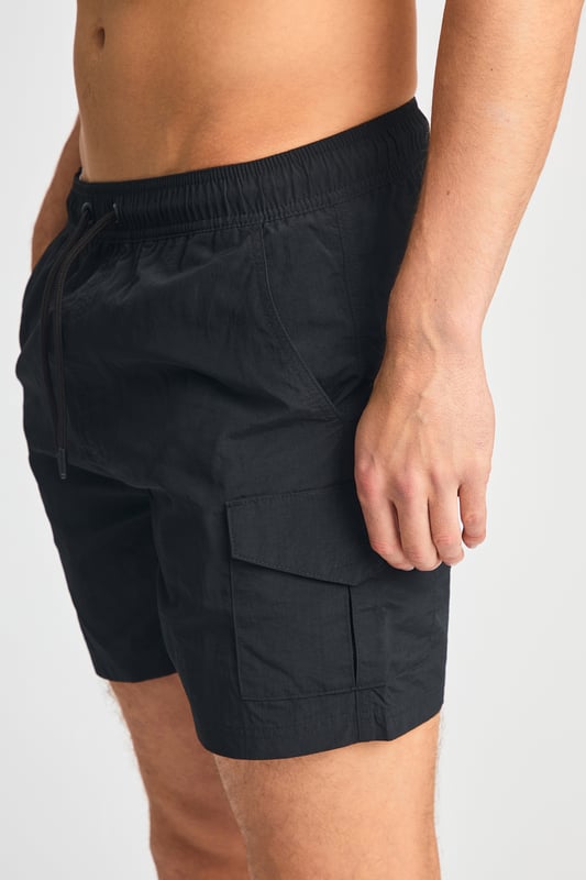 This two pack of combat, cargo-style swim shorts from French Connection are perfect for the beach or by the pool. Each swim short features an elasticated waistband with a drawcord, two side pockets and two cargo-style pockets. Made from quick-drying, polyester with mesh liner. This pack contains two swim shorts in black and khaki.