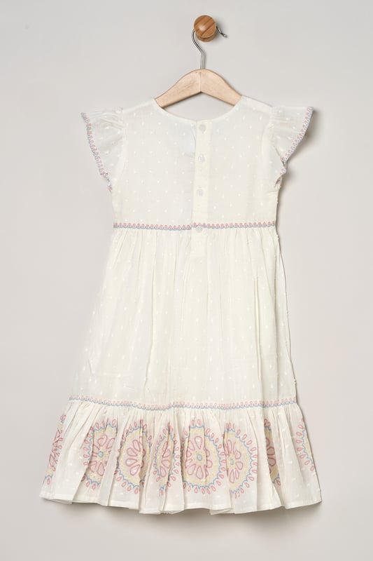 This printed summer dress by Miss is the perfect addition to your little ones summer wardrobe. Featuring tiered ruffles, flutter sleeves, and a delicate floral prints on the top and skirt creating a stylish and playful look perfect for sunny days, casual outings, or special occasions.