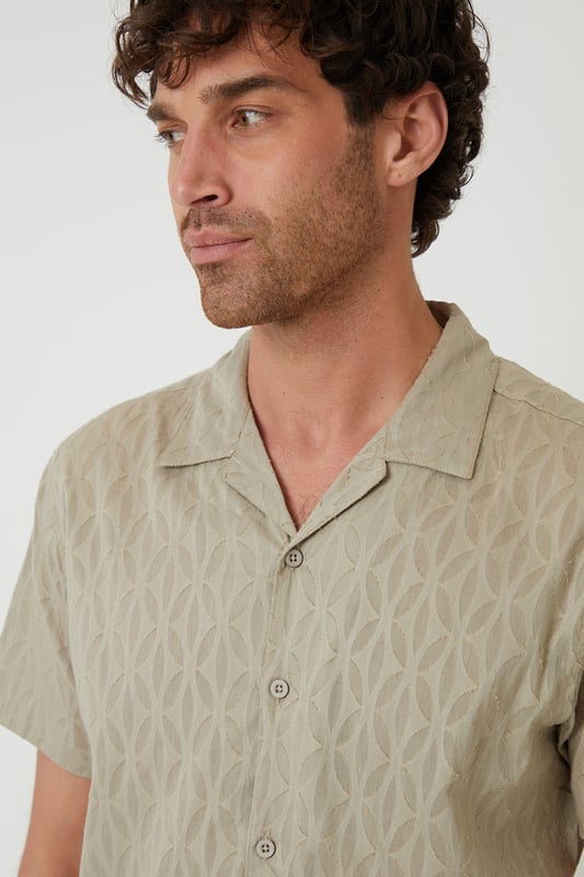 Freshen up your summer wardrobe with this textured shirt from Threadbare. This short-sleeved cotton shirt in a regular fit is designed with a revere collar and button down fastening. Team with denim shorts or smarten up with a pair of chinos.