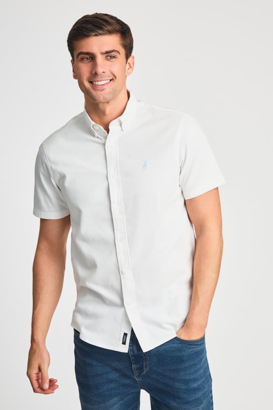 This cotton oxford style shirt from Kensington Eastside is a wardrobe staple. Features button-down collar, embroidered logo and short sleeve. Made from cotton fabric to ensure comfort and high quality. Other colours available.