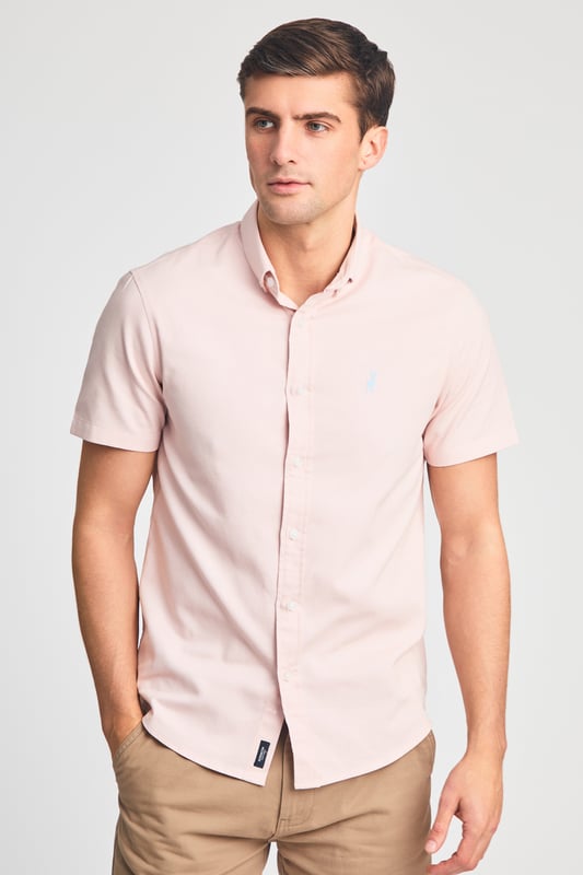 This cotton oxford style shirt from Kensington Eastside is a wardrobe staple. Features button-down collar, embroidered logo and short sleeve. Made from cotton fabric to ensure comfort and high quality. Other colours available.