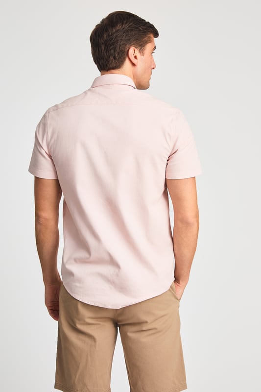 This cotton oxford style shirt from Kensington Eastside is a wardrobe staple. Features button-down collar, embroidered logo and short sleeve. Made from cotton fabric to ensure comfort and high quality. Other colours available.