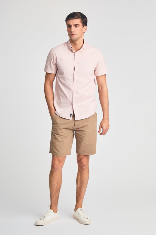 This cotton oxford style shirt from Kensington Eastside is a wardrobe staple. Features button-down collar, embroidered logo and short sleeve. Made from cotton fabric to ensure comfort and high quality. Other colours available.