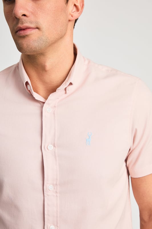 This cotton oxford style shirt from Kensington Eastside is a wardrobe staple. Features button-down collar, embroidered logo and short sleeve. Made from cotton fabric to ensure comfort and high quality. Other colours available.