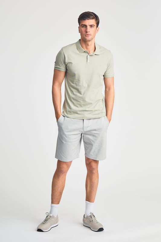 This three pack of polo shirts from French Connection offers both great value and style. These polo shirts are versatile and perfect for your new season wardrobe. Featuring a small embossed French Connection logo on the chest, short sleeves and a classic button-up polo collar. Made from cotton fabric to ensure comfortable wear. The pack contains three polo shirts in the colours shown.