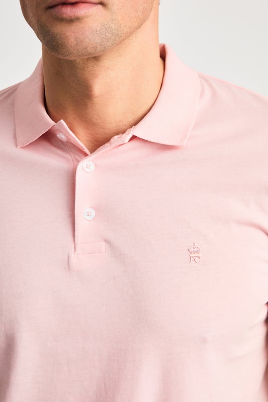 This three pack of polo shirts from French Connection offers both great value and style. These polo shirts are versatile and perfect for your new season wardrobe. Featuring a small embossed French Connection logo on the chest, short sleeves and a classic button-up polo collar. Made from cotton fabric to ensure comfortable wear. The pack contains three polo shirts in the colours shown.