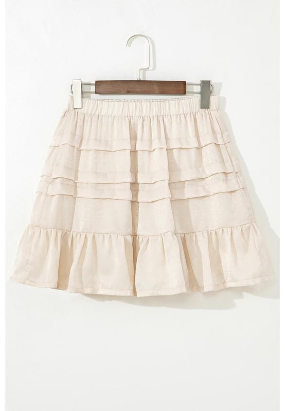 Falda mini beige con dobladillo acampanado y volantes
  Estilo acampanado que favorece con un dobladillo con volantes
  Cintura elástica para un ajuste cómodo
  Falda mini versátil adecuada para diversas ocasiones
  Se combina bien con camisetas y tops
Material: 100% Poliéster