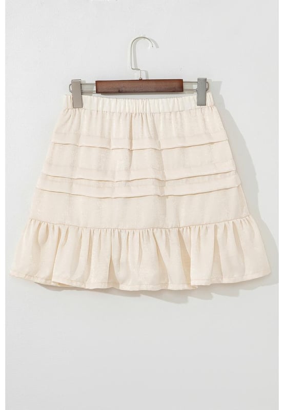 Falda mini beige con dobladillo acampanado y volantes
  Estilo acampanado que favorece con un dobladillo con volantes
  Cintura elástica para un ajuste cómodo
  Falda mini versátil adecuada para diversas ocasiones
  Se combina bien con camisetas y tops
Material: 100% Poliéster