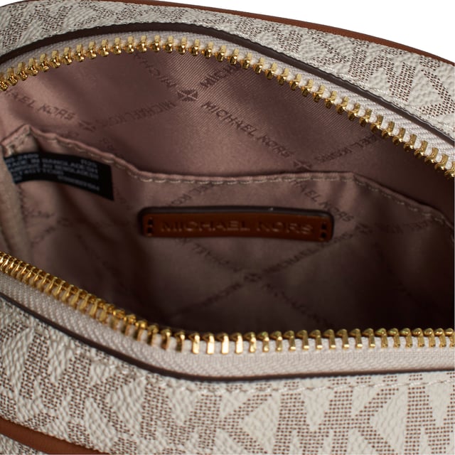 Ideal for travel and city walks, this crossbody bag features our signature logo print and features a convenient canvas strap and multiple pockets to keep your essentials organized and close at hand.\n\n Details:\n - Accessory type: Shoulder bag.\n - Canvas with logo print.\n - Application of the brand name in metal.\n - Hardware: Gold tone.\n - Exterior details: 2 front zipper pockets.\n - Interior details: Open back pocket.\n - Adjustable strap.\n - Closure: Zipper.\n\n Each of Michael Kors' accessories collections features a strong identity, offering a fresh mix of trends, colors, and silhouettes that never go out of style, with urban style and attitude. Each women's shoulder bag designed by Michael Kors is an affordable luxury with a touch of modern, unexpected, and comfortable glamour, offering a piece for every occasion.\n Measures: 14 cm (W) x 19.1 (H) x 5.1 cm (D)\n Composition: 89.4% Coated Canvas, 9.6% Polyester, 1% Polyurethane\n Care:\nClean with a dry or slightly damp cloth.