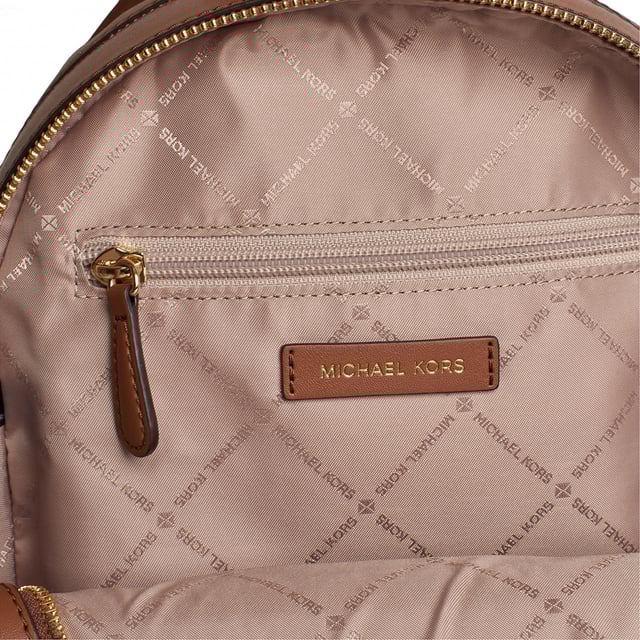 The combination of a signature print and luxurious leather details come together in this Jaycee backpack, a timeless essential destined to become your new hands-free favorite. It features a front zippered pocket for convenient access and plenty of room inside to store your laptop and other essentials.\n\n Details:\n - Accessory type: Medium backpack.\n - Material: Coated canvas printed with the logo.\n - Hardware: Gold tone.\n - Exterior details: Front zipper pocket.\n - Compartments: 2, one has a zippered back pocket.\n - Adjustable straps.\n - Closure: Zipper.\n\n Each of Michael Kors' accessories collections boasts a strong identity, offering a fresh mix of timeless trends, colors, and silhouettes, combined with urban style and attitude. Each women's backpack designed by Michael Kors is an affordable luxury with a touch of modern, unexpected, and comfortable glamour, offering a piece for every occasion.\n Measures: 22.2 cm (width) x 30.5 cm (height) x 10.8 cm (depth)\n Composition: 89.4% Coated Canvas, 9.6% Polyester, 1% Polyurethane\n Care:\nClean with a damp cloth.