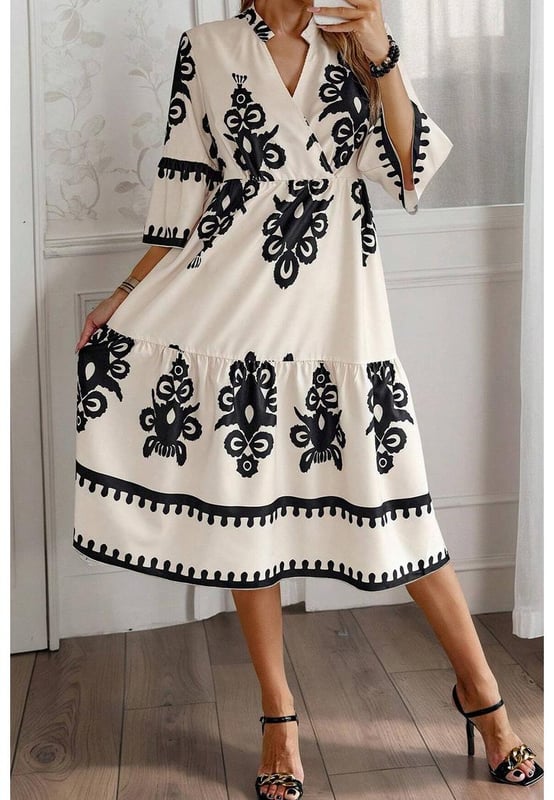 Our styles are designed with a trendy fitted look in mind following an international size standard. For the best fit we suggest choosing one size up from your usual. Be sure to check our sizing chart to find your perfect match!
  Beige Western Geometric Print Midi Dress
  Eye
  catching geometric print
  Flattering V
  neck wrap design
  3/4 sleeves for a stylish and versatile silhouette
  High waist detail enhances the figure
Material: 100% Polyester