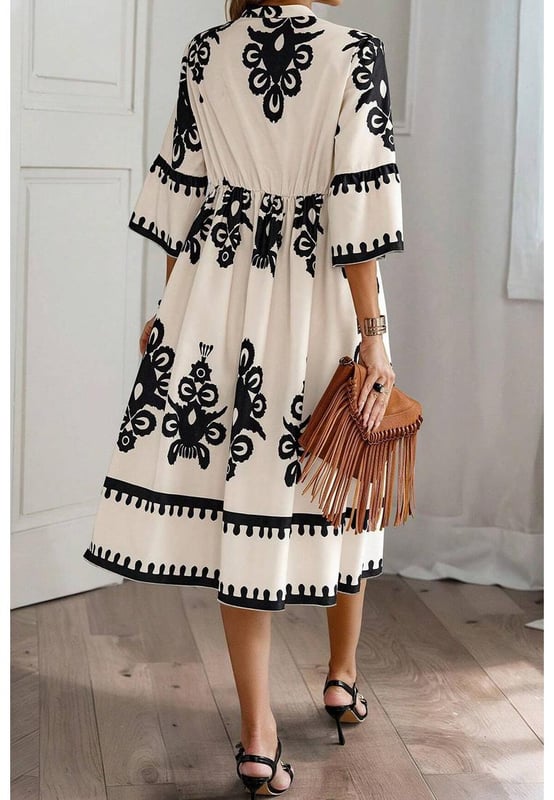 Our styles are designed with a trendy fitted look in mind following an international size standard. For the best fit we suggest choosing one size up from your usual. Be sure to check our sizing chart to find your perfect match!
  Beige Western Geometric Print Midi Dress
  Eye
  catching geometric print
  Flattering V
  neck wrap design
  3/4 sleeves for a stylish and versatile silhouette
  High waist detail enhances the figure
Material: 100% Polyester