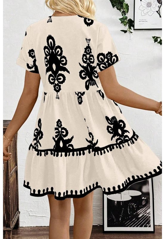Black vintage print dress
  V
  neckline for an elongated look
  High waist design to accentuate curves
  Short sleeves for versatile and practical wear
Material: 100% Polyester