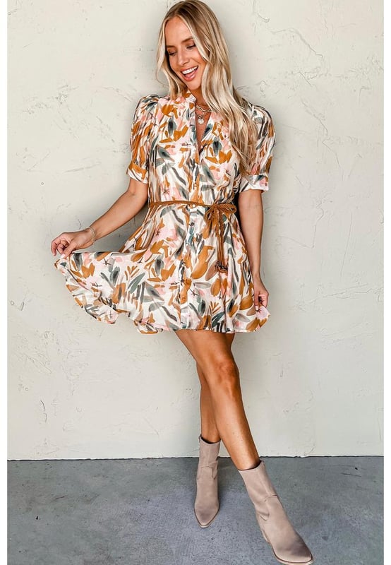 Brown abstract printed mini dress
  Chic puff sleeves
  Button
  up front
  Braided belt
  Can be styled with sandals high heels or flats
Material: 100% Polyester