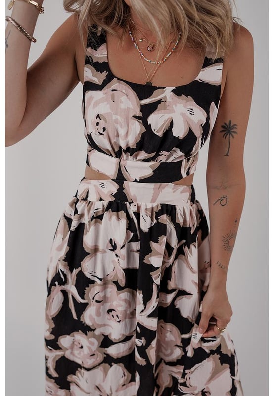 Black floral cutout maxi dress
  Square neck
  Sleeveless design
  Maxi length
  Knot back detail
  Flowy silhouette
Material: 100% Viscose