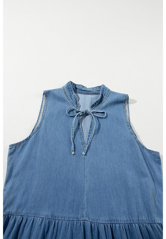 Our styles are designed with a trendy fitted look in mind following an international size standard. For the best fit we suggest choosing one size up from your usual. Be sure to check our sizing chart to find your perfect match!
  Sleeveless design with tied neck for a classic yet modern look
  Tiered design offers a flattering silhouette
  Made from breathable chambray fabric for comfort and durability
  Easy to pair with sandals or flats for a chic appearance
  Suitable for various events
Material: 95% Cotton 5% Polyester