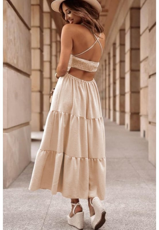 Our styles are designed with a trendy fitted look in mind following an international size standard. For the best fit we suggest choosing one size up from your usual. Be sure to check our sizing chart to find your perfect match!
  Flattering fit that accentuates curves
  Sleeveless design
  Crossover backless style
  Perfect for hot summer days
  Tiered skirt for an elegant and flowy silhouette
  Made from selective cozy and breathable fabric
Material: 100% Polyester