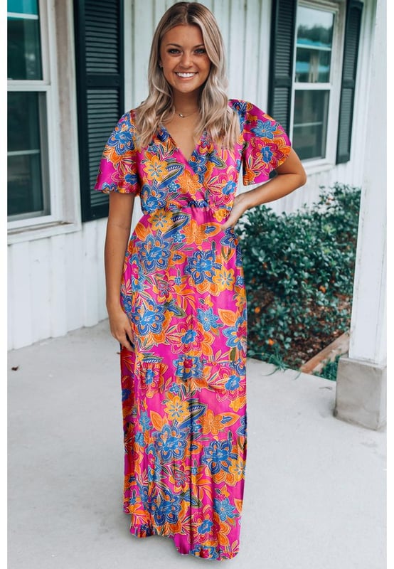 Our styles are designed with a trendy fitted look in mind following an international size standard. For the best fit we suggest choosing one size up from your usual. Be sure to check our sizing chart to find your perfect match!
  Beautiful floral print
  Wrap top with V
  neckline
  Flutter sleeves
  Elastic waist
  Flattering to all body types
  Perfect for summer holidays parties and daily wear
  Sassy bohemian vibe
Material: 100% Viscose