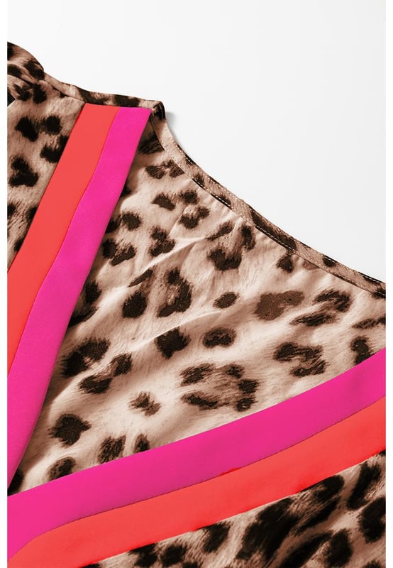 Our styles are designed with a trendy fitted look in mind following an international size standard. For the best fit we suggest choosing one size up from your usual. Be sure to check our sizing chart to find your perfect match!
  Trendy leopard print
  Striking color block design
  V neck detail
  Loose and flowy fit
  Part of ?? maxi dress collection
Material: 100% Polyester