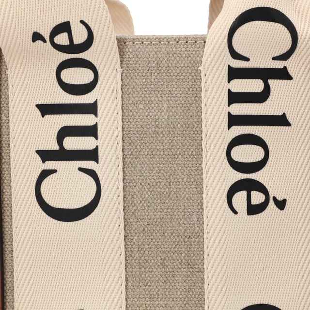 Tote bag in linen canvas &amp; shiny calfskin with linen Chloé logo
 Main material: Linen
 Secondary material: Calfskin
 Trim: Polyester
 Carry: Shoulder, arm &amp; cross-body
 

 - 2 short handles
 - Removable long strap
 - 1 spacious main compartment
 - 1 internal flat pocket
 Comes with a dust bag
 

 - Width: 10.4" (26.5 cm)
 - Height: 7.9" (20 cm)
 - Depth: 3.1" (8 cm)
 - Handle drop: 4.3" (11 cm)
 - Strap drop: 20.5" (52 cm)