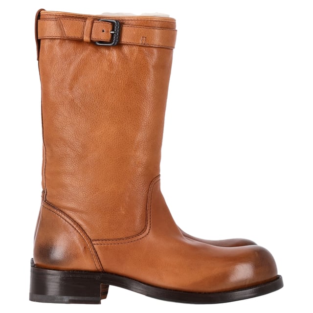 VINTAGE, RRP AS NEW
Boots are an essential part of your winter wardrobe, and these brown leather boots from Bottega Veneta are effortlessly stylish. Mid-leg high, a strap detail around the top, the shape and cut of the leather are gently equestrian. Sturdy soled, these would be great over the top of skinny jeans for a casual day out.

Bottega Veneta Biker Boots in Brown Leather
Condition: Very good
Signs of wear: Minor markings, Lightly used but very well maintained. Minor mark at soles & creasing, light scuffing at the soles and heels.
Packaging: Dust bag
Color: Brown 
Material: Leather | leather
Size: EU | 36
Measurements: Insole length: 280
SKU: HNPUGBSH466648W