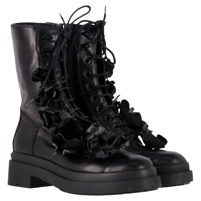 VINTAGE, RRP AS NEW
Romantic rebellion takes form in the Jimmy Choo Nari Flowers Combat Booties—a bold twist on the classic combat boot. Crafted in soft black lambskin leather, these Italian-made booties balance edge and elegance with intricate 3-D floral appliqués that bloom across the upper. A round cap toe, lace-up vamp, and side zip closure combine practicality with style, while a durable leather and rubber outsole ensures everyday wearability. Whether you're toughening up a feminine look or grounding a street-style outfit, these booties are the perfect floral statement.

with Box

Jimmy Choo Nari Flowers Combat Booties in Black Leather
Condition: Excellent
Signs of wear: Include Box., No visible sign of wear. No Mark at insole.,  Very light mark at soles.
Packaging: Box
Color: black
Material: Leather | leather
Size: EU | 37.5
Measurements: Heel height: 50; Insole length: 300
SKU: NAPPUGBSH466103W