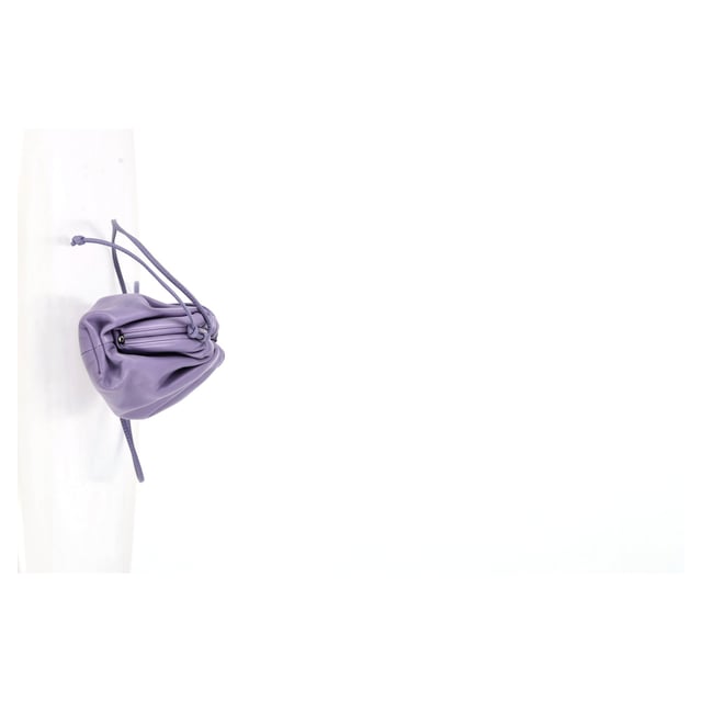 VINTAGE, RRP AS NEW
Add a splash of color to your accessory collection with the Bottega Veneta Mini Pouch in Pastel Purple Lambskin Leather. This beautifully crafted pouch features a soft leather body that feels luxurious to the touch, paired with a flat leather strap for easy wear. The magnetic closure ensures secure storage while maintaining a sleek, minimalist design. This mini pouch is the perfect accessory to complement a white flowy dress or a tailored pantsuit, adding a pop of pastel to your outfit. It can also be styled with a casual weekend look, such as a denim jacket and high-waisted jeans, for an effortlessly chic appearance. Ideal for both day-to-night wear, this versatile bag will bring a modern twist to your ensemble.
with Dust bag
Bottega Veneta Mini Pouch in Pastel Purple Lambskin Leather
Condition: Excellent
Signs of wear: No retail tag, No visible sign of wear., 
Packaging: Dust bag
Color: pastel purple
Material: Leather | leather
Size: One Size | One Size
Measurements: Width: 60; Height: 120; Length: 220; Handle drop: 630; Strap length: 1260
SKU: 468518 / NAPPUGBBA462920W