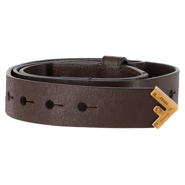 VINTAGE, RRP AS NEW
The Fendi Wide Wrap Belt in brown leather is a timeless accessory designed for ultimate versatility and style. Made from thick, supple leather, this belt can be worn in multiple ways – on the hips, around the waist, or wrapped "up-n-over" for a bold, dramatic look. The rich dark chocolate hue pairs perfectly with its antiqued gold buckle, creating a luxurious contrast that elevates any outfit. Whether layered over a dress, cinched around a coat, or paired with your favorite high-waisted trousers, this belt offers endless styling options.


Fendi Wide Wrap Belt in Brown Leather
Condition: Very good
Signs of wear: Lightly used but very well maintained, May show minor signs of wear, scratches , worn corners, minor interior wear.
Packaging: None
Color: Brown 
Material: Leather | leather
Size: One Size | One Size
Measurements: Width: 40; Length: 1260
SKU: TONPUGBAC464108W
