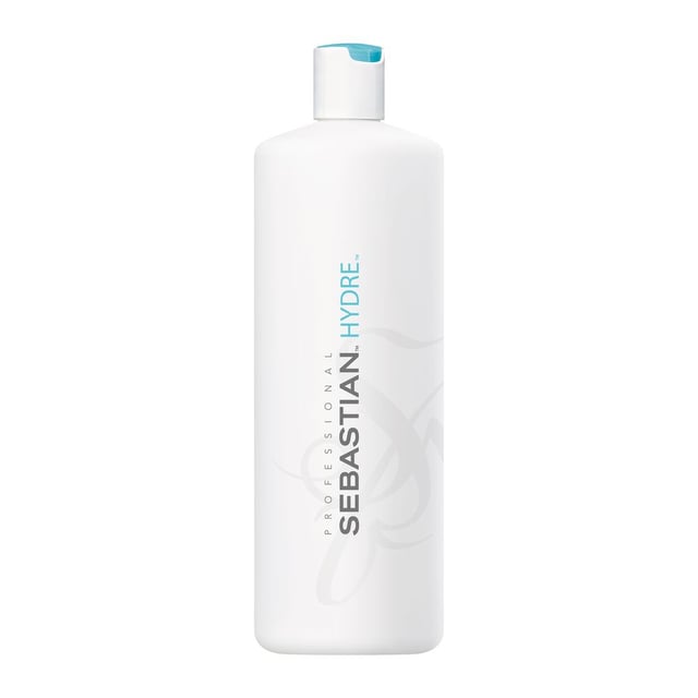 Revitalize your hair with Sebastian Professional Hydre Moisturizing Conditioner, designed to quench the thirst of dry and frizzy hair. This luxurious conditioner delivers intense hydration, leaving your locks silky smooth and full of bounce. Its nourishing formula rehydrates and rejuvenates, making your hair more manageable while enhancing its health and shine. For optimal results, apply generously to wet hair, massage through to the ends, and rinse thoroughly. Please note, this supersize conditioner does not include a pump for easy dispensing.