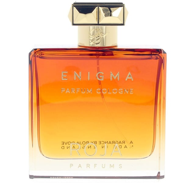 Discover the allure of Roja Parfums Enigma Pour Homme, a captivating men's cologne that embodies sophistication and mystery. This fragrance opens with a zesty burst of mandarin, lemon, and bergamot, leading to a heart rich in floral notes like neroli, geranium, and jasmine. The base is an exquisite blend of spices and woods, featuring cardamom, ginger, patchouli, and a hint of tobacco, creating a warm and inviting scent. Perfect for the modern man, Enigma Pour Homme is designed for those who appreciate the finer things in life.