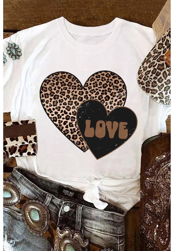 Our styles are designed with a trendy fitted look in mind following an international size standard. For the best fit we suggest choosing one size up from your usual. Be sure to check our sizing chart to find your perfect match!
  White Leopard LOVE Double Heart Printed Valentines Graphic Tee
  Large leopard heart and small letter
  printed heart design
  Cotton
  blend fabric for a soft and lightweight feel
  Simple yet chic design suitable for all ages
  Perfect for adding a playful touch to your Valentines Day outfit
Material: 62% Polyester 32% Cotton 6% Elastane