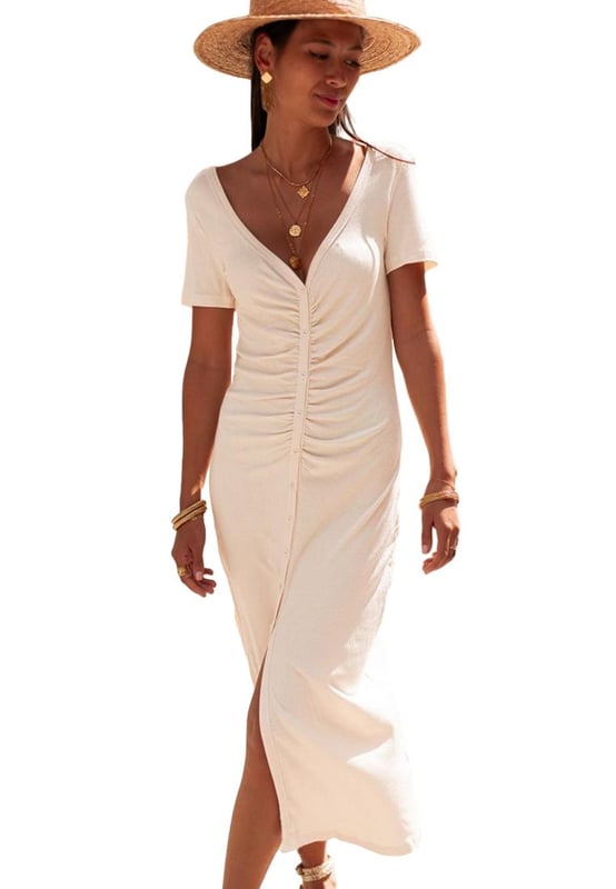 Chic and flattering pencil style
  Streamline tailored design
  V neck front and low scoop back
  Buttons front and ruched design
  Longline silhouette with slit
  High elasticity
  Detailed size chart provided
Material: 93% Viscose 7% Elastane