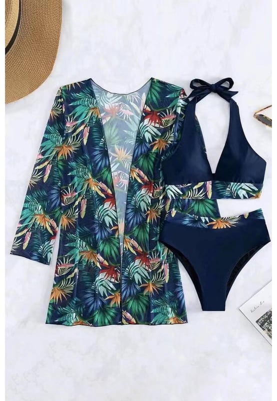 Three
  piece ensemble for versatile looks
  Lively and colorful tropical print
  Contrast trim detailing adds a stylish and modern element
  Halter neck design provides lift and support for the bust
  Available in various sizes according to the size chart provided
Material: 100% Polyester