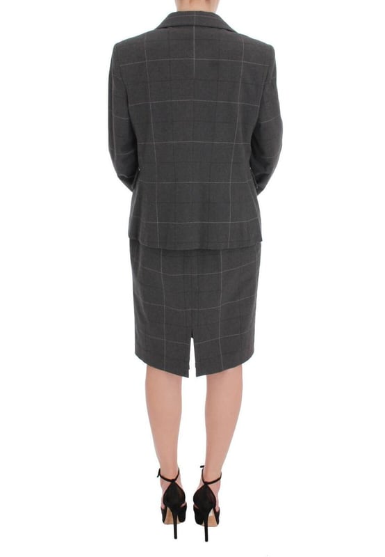 Brand: BENCIVENGA
  Model: Two piece suit; blazer and dress
  Color: Gray checkered
  Material: 80% Cotton 20% Viscose
  Blazer: One button closure single breasted
  Dress: Full zipper closure on the back
  Fully lined
  Logo details
  Made in Italy