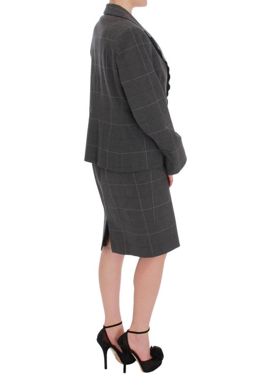 Brand: BENCIVENGA
  Model: Two piece suit; blazer and dress
  Color: Gray checkered
  Material: 80% Cotton 20% Viscose
  Blazer: One button closure single breasted
  Dress: Full zipper closure on the back
  Fully lined
  Logo details
  Made in Italy