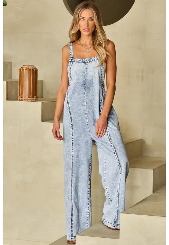 Overol de mezclilla vintage y a la moda  
Tono de lavado claro  
Costura deshilachada expuesta  
Diseño sin mangas  
Pierna ancha para un look más esbelto y alto  
Jumpsuits baratos con dropshipping desde China de excelente calidad  
Tabla de tallas proporcionada para mayor comodidad  
Material: 95% algodón, 5% poliéster