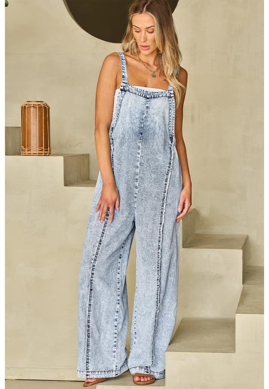 Overol de mezclilla vintage y a la moda  
Tono de lavado claro  
Costura deshilachada expuesta  
Diseño sin mangas  
Pierna ancha para un look más esbelto y alto  
Jumpsuits baratos con dropshipping desde China de excelente calidad  
Tabla de tallas proporcionada para mayor comodidad  
Material: 95% algodón, 5% poliéster