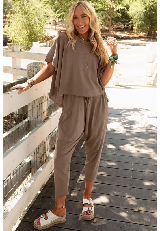 Soft and stretchy material for all
  day comfort
  Relaxed and loose fit for ultimate boho style
  Slouchy swingy top with dropped shoulders and loose short sleeves
  High
  low bottom edge on top
  Matching high
  rise pants with elastic drawstring waistband
  Dropped crotch and exposed seams on pants
  Casual and fashionable
  Please refer to size chart for accurate sizing