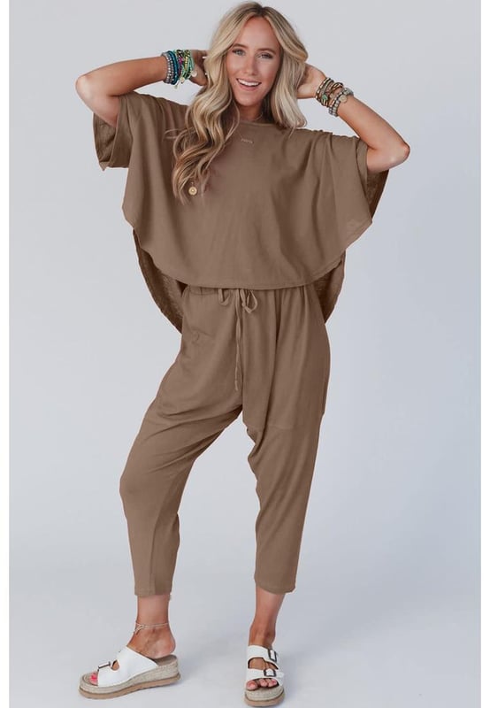 Soft and stretchy material for all
  day comfort
  Relaxed and loose fit for ultimate boho style
  Slouchy swingy top with dropped shoulders and loose short sleeves
  High
  low bottom edge on top
  Matching high
  rise pants with elastic drawstring waistband
  Dropped crotch and exposed seams on pants
  Casual and fashionable
  Please refer to size chart for accurate sizing
