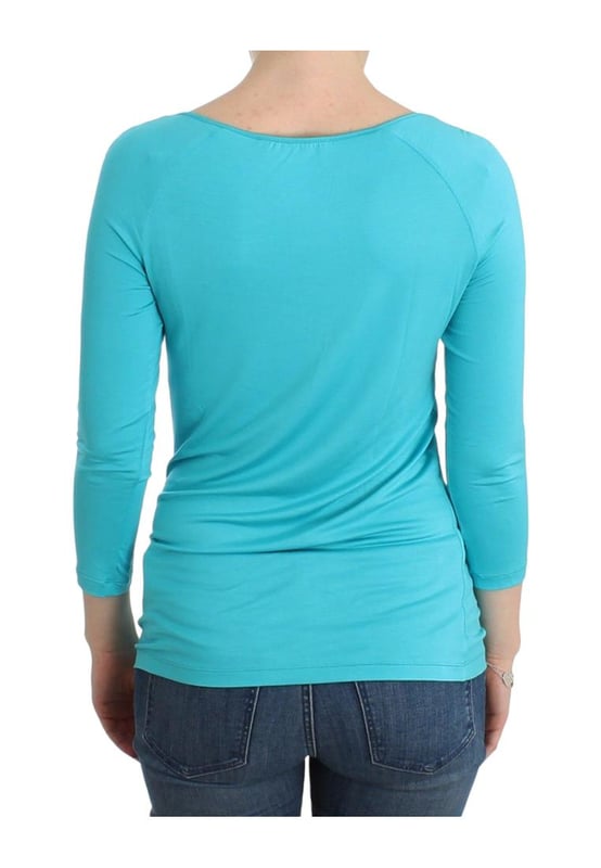 Autentico top de lenceria Ermanno Scervino con manga 3/4.
  Hecho en Italia.
  Material: 96% modal 4% elastano.
  Color: Azul.
  Manga 3/4.
  Detalles del logotipo.
  A estrenar con etiquetas.