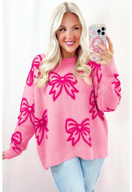 Feminine bow pattern
  Loose fit suitable for all body shapes
  Drop shoulder design for a laid
  back look
  Soft and warm knit material
  Ideal for cold winter season