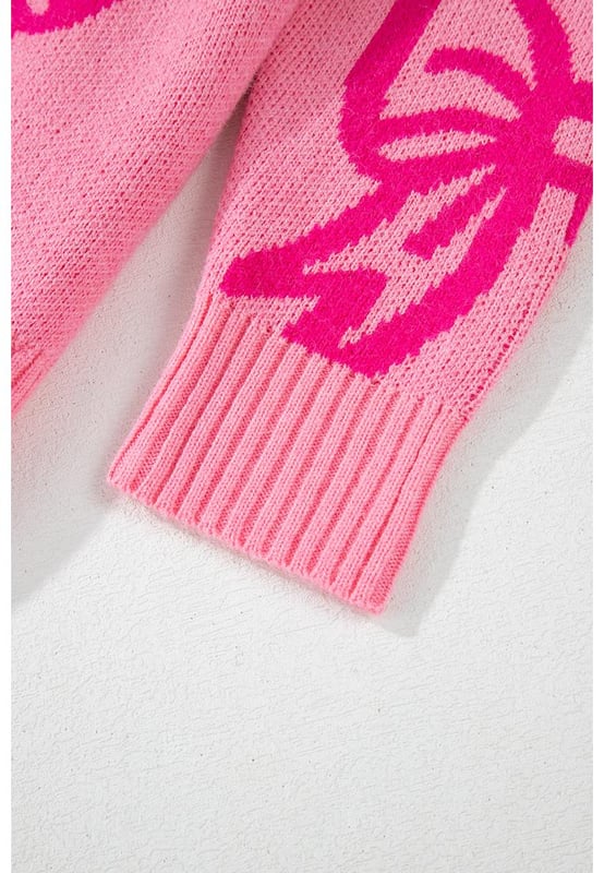 Feminine bow pattern
  Loose fit suitable for all body shapes
  Drop shoulder design for a laid
  back look
  Soft and warm knit material
  Ideal for cold winter season